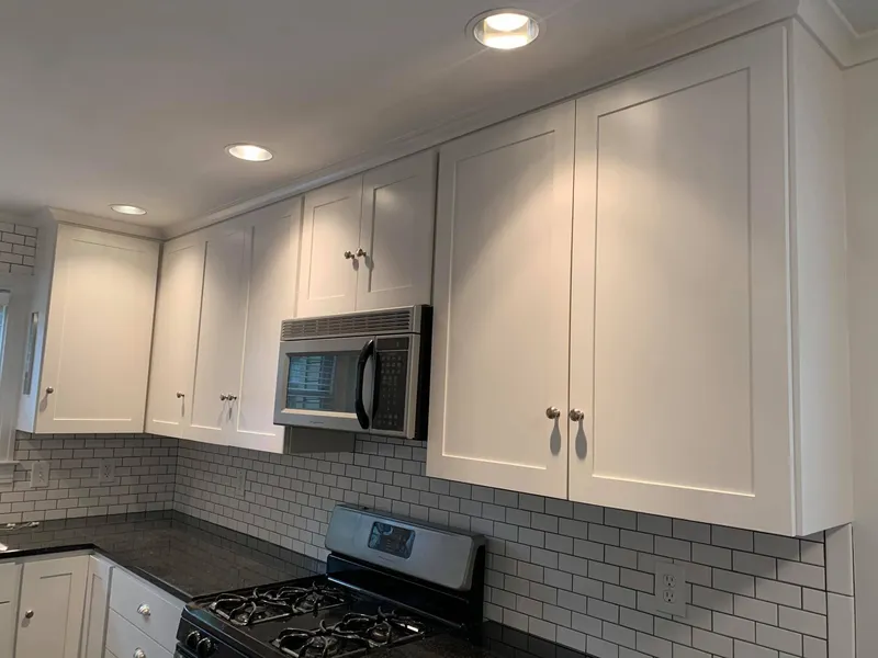 Kitchen cabinet interiors and recessed lighting.